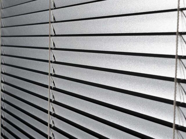 WhatsApp Image 2026-04-07 at 15.18.34 Aluminum Venetian blinds in Perth with sleek horizontal slats controlling sunlight in a contemporary interior setting