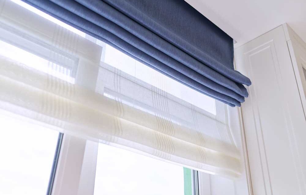 Roman Blinds for Better Light Control and Privacy in Perth Homes Modern Roman blinds for stylish light control and privacy in a contemporary Perth home interior